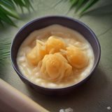 技术编辑张枚的职业照，戴着细框眼镜，正在专注地查看代码与网页性能指标，技术气质鲜明